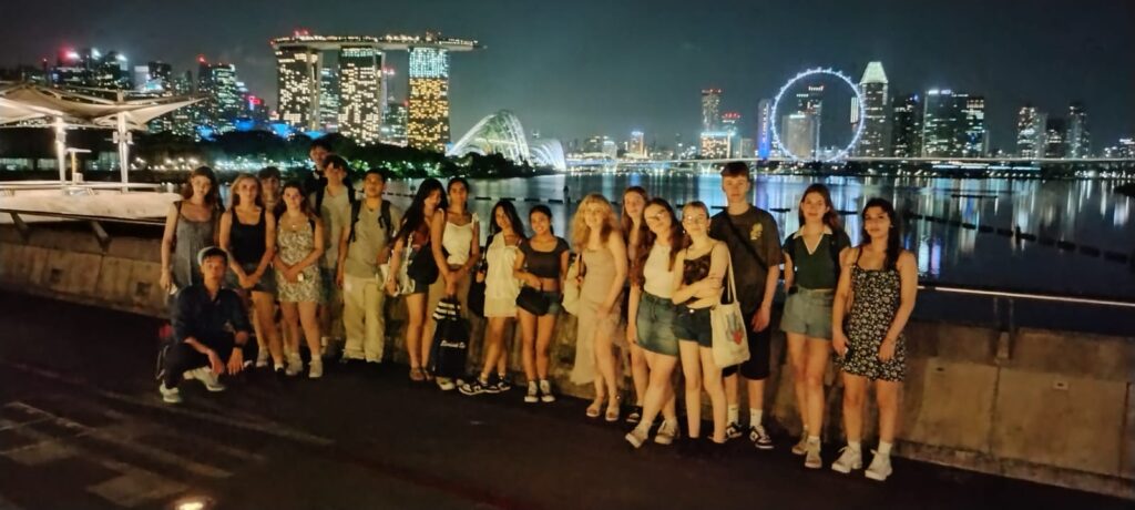 Students, night time, skyscrapers, Asia, 