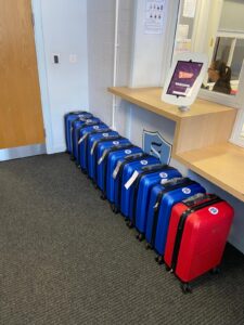 Suitcases in school reception.