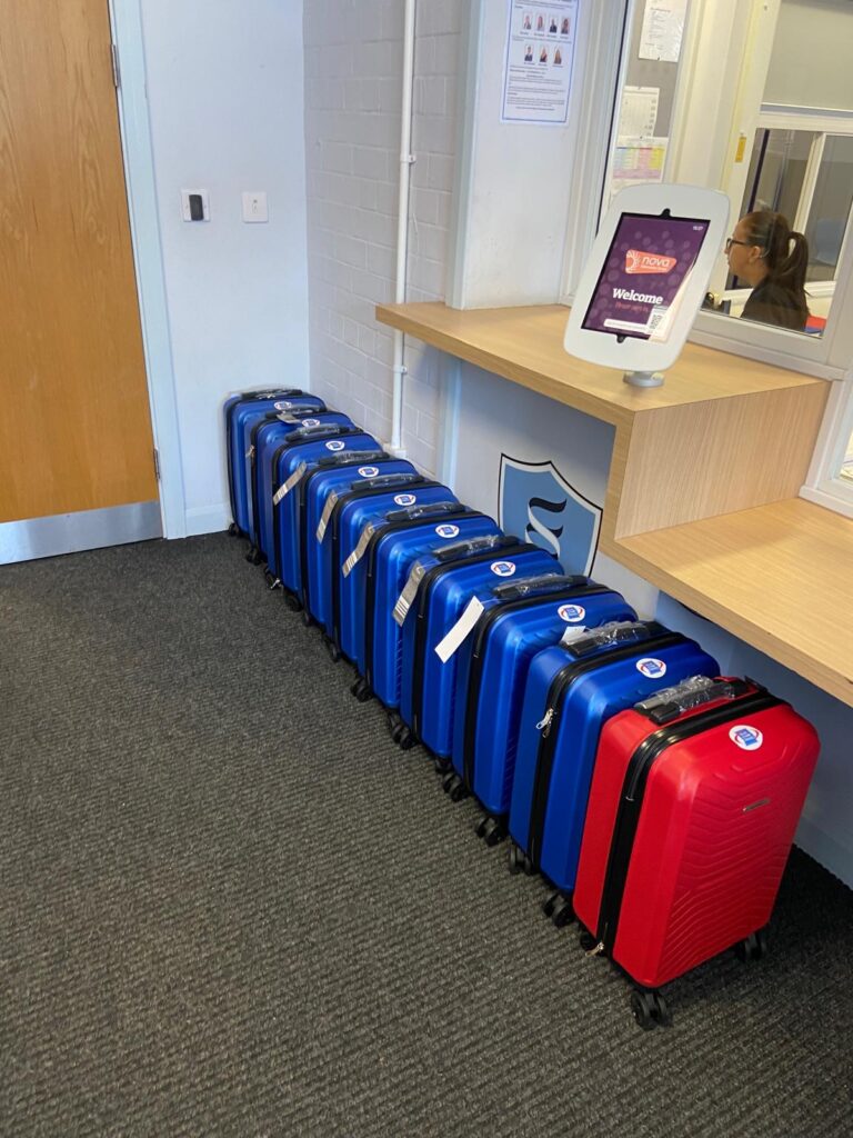 Suitcases in school reception.