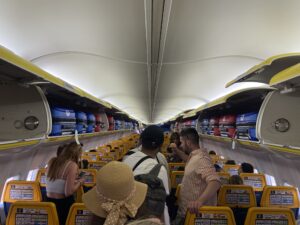 Blue Stamp suitcases in the cabin luggage.