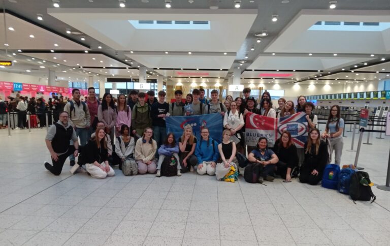 Long Road Sixth Form College at the airport, ready to fly to Singapore.
