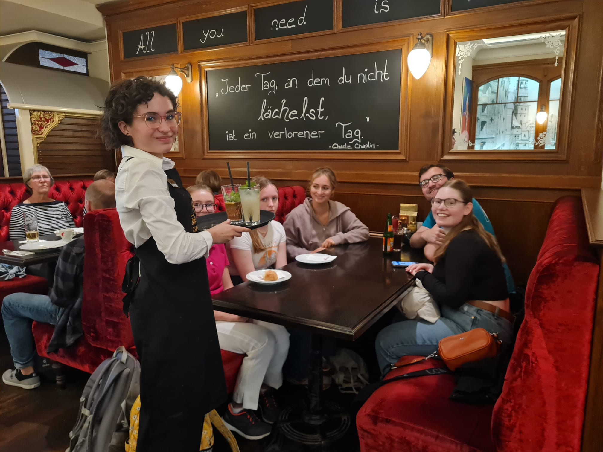 Students enjoy an evening meal in a traditional Hamburg restaurant