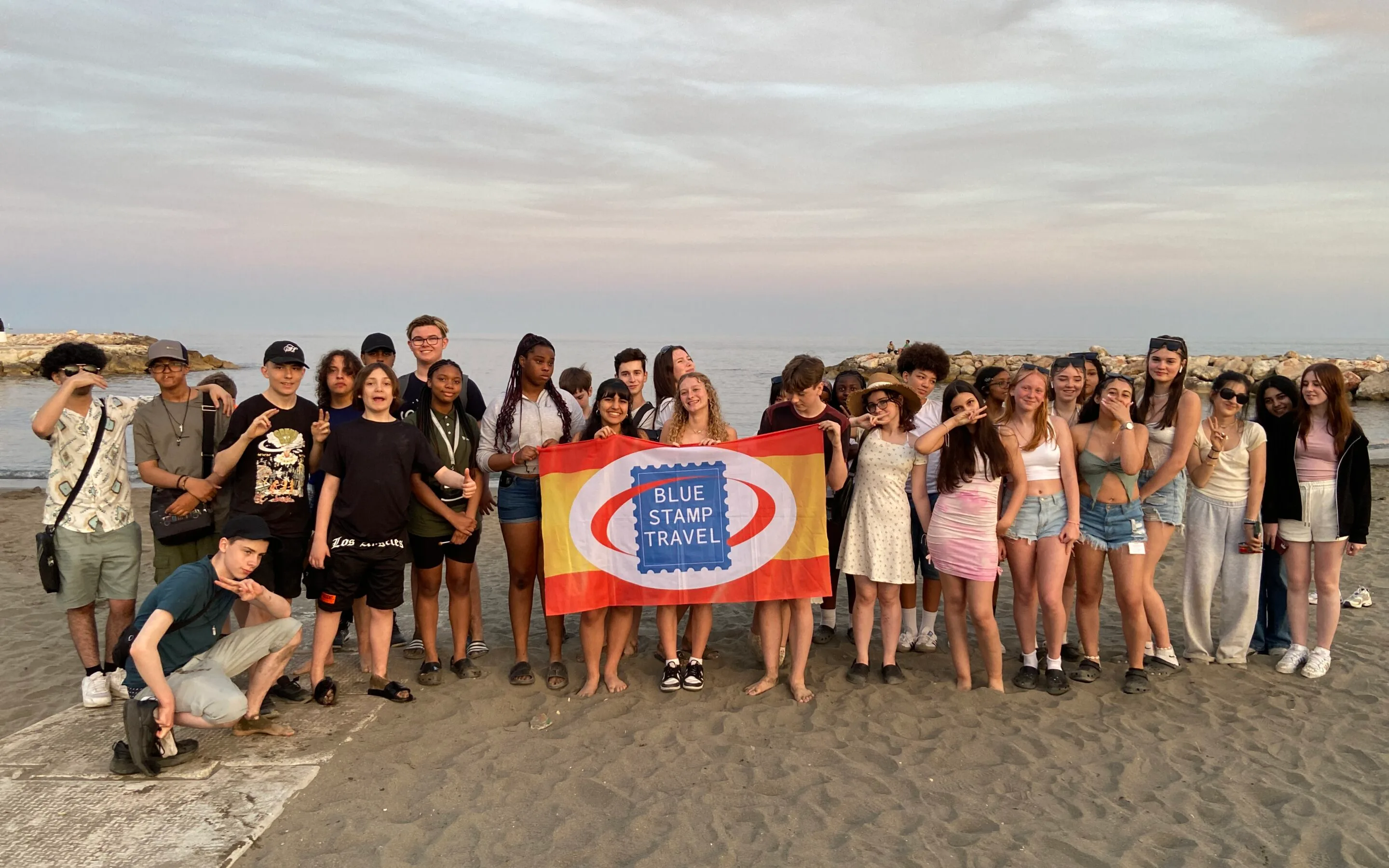 Students on a beach in Malaga on an Intensive Spanish school trip.