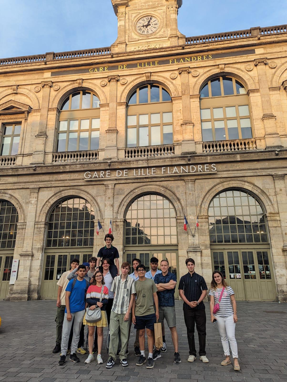 A group of students in Lille in front of a historic building