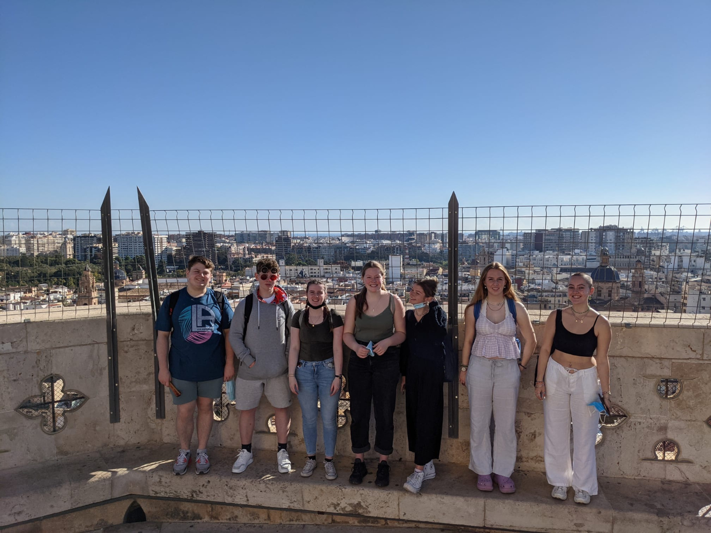 Students stand on top of a tall building in Valencia