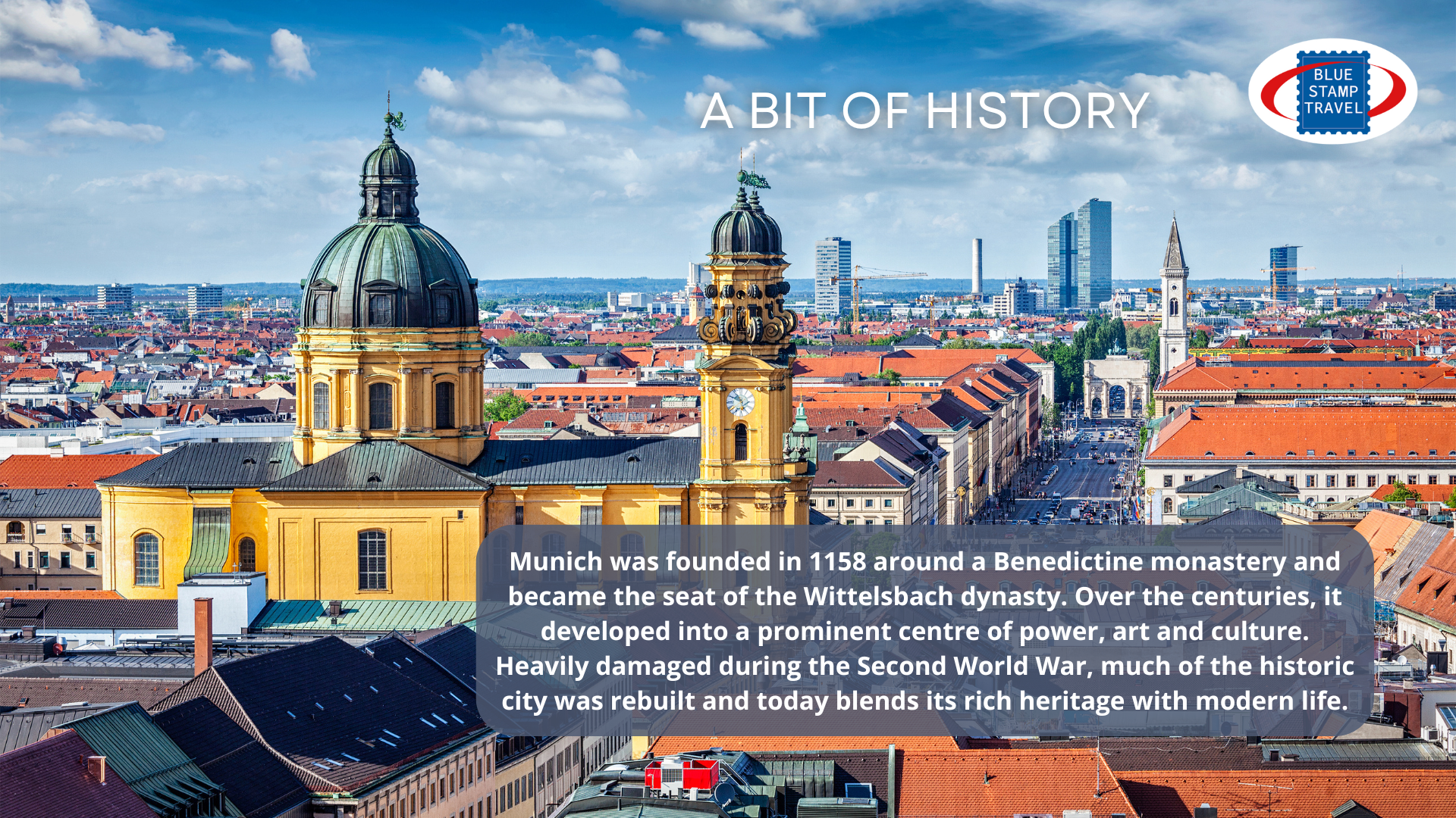 The distinctive red roofs of Munich, looking towards a yellow church with a dome
